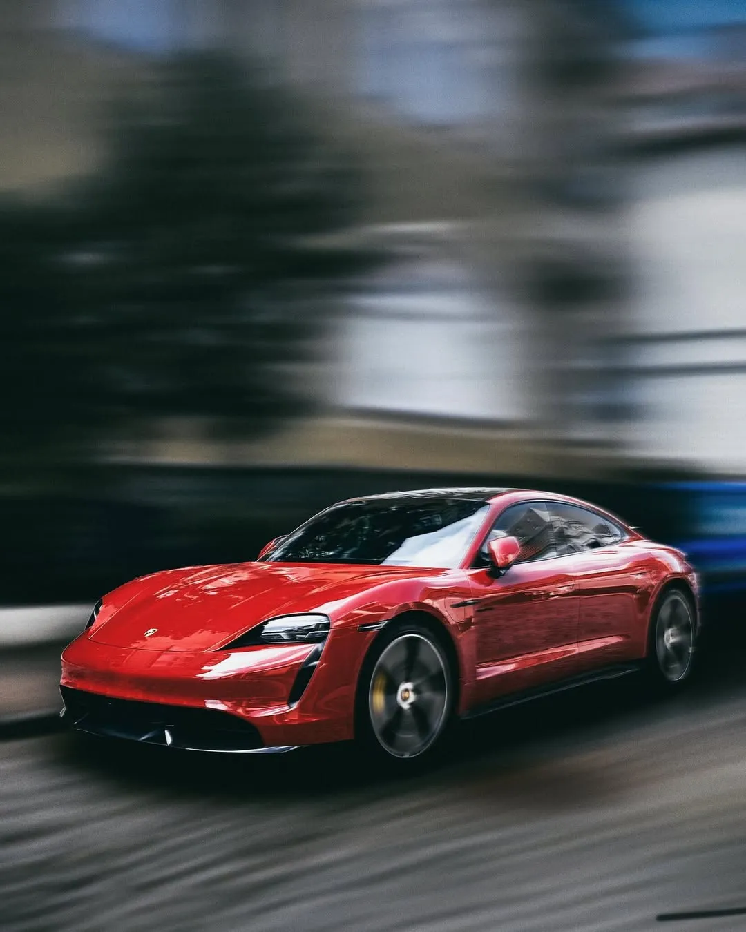 Czerwone Porsche w ruchu, zdjecie techniką panningu
